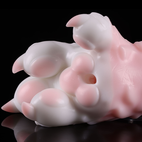 Drake's Claw's pink paw pads