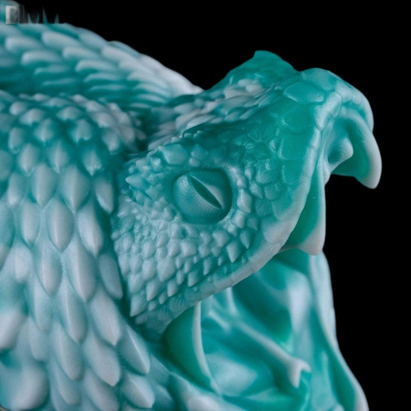 Viper Fang mythic relic - closeup of stylized geometric head with fang sculpted entrance